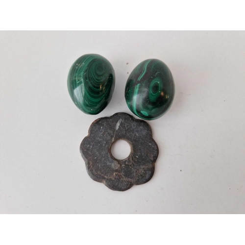 133 - A bag containing two Malachite eggs and a Scottish silver agate brooch