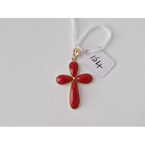 154 - 18ct gold marked coral set pendant designed as a cross