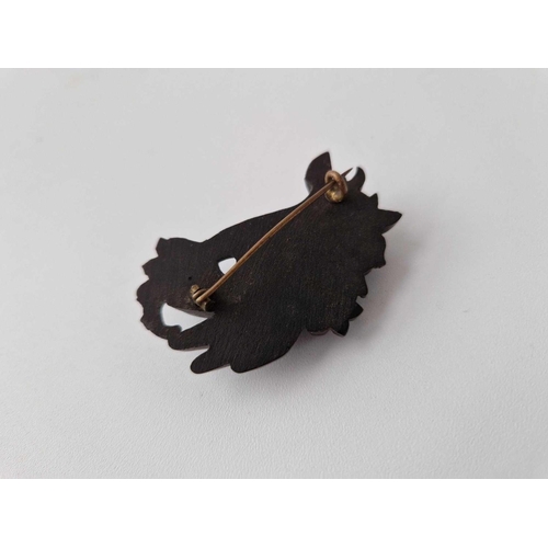 166 - A large Victorian mourning brooch of hand holding flowers