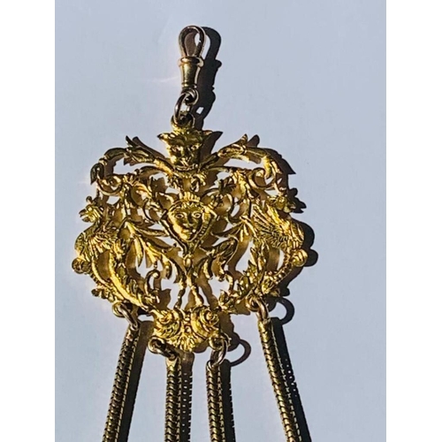 180 - ANTIQUE GOLD ITALIAN CHATELAINE THE CENTRE PLAQUE 
high carat gold with lion mask motif and four 15c... 