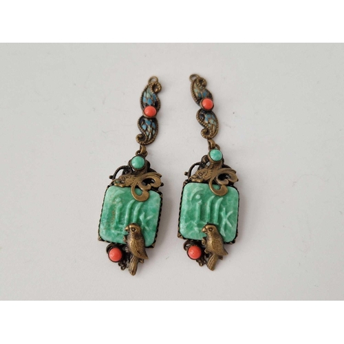 190 - A pair of art deco metal earrings