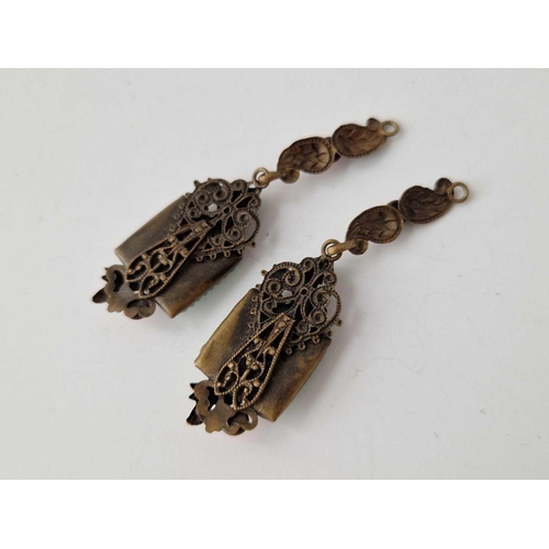 190 - A pair of art deco metal earrings