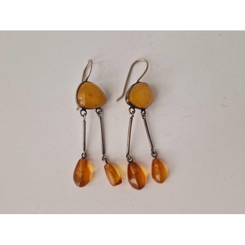 192 - A pair of Russian silver and amber earrings