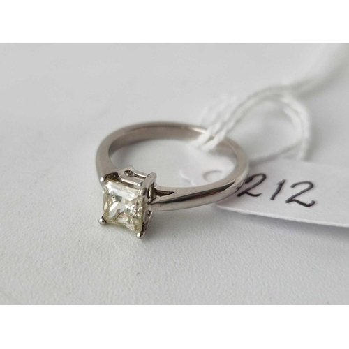 212 - A PLATINUM MOUNTED BAGUETTE DIAMOND SINGLE STONE 
RING DIAMOND WEIGHT 1.04 CTS SIZE L 4.9 GMS