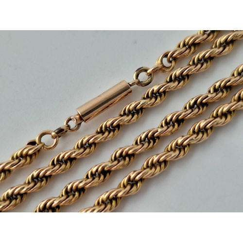 225 - AN ANTIQUE ROPE NECK CHAIN, 15ct with 9ct barrel clasp, 17 inch, 11.3 g