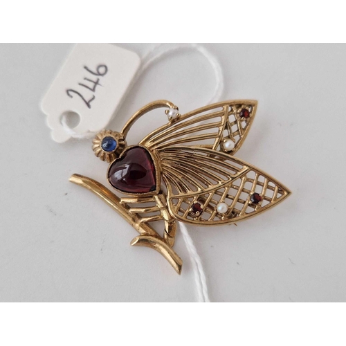 246 - 1950s butterfly brooch with central heart shaped garnet, Sapphire eye,
with further garnet and pearl... 