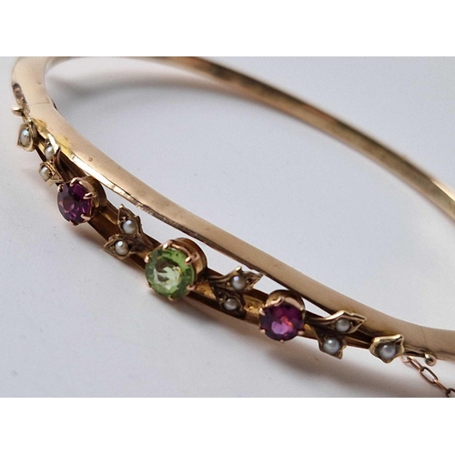 270 - An antique suffragette? Pearl, peridot & ruby bangle boxed 5.6g