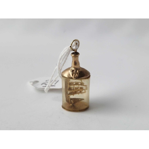 271 - An unusual heavy 9ct �Ship in a bottle� charm 4.9g