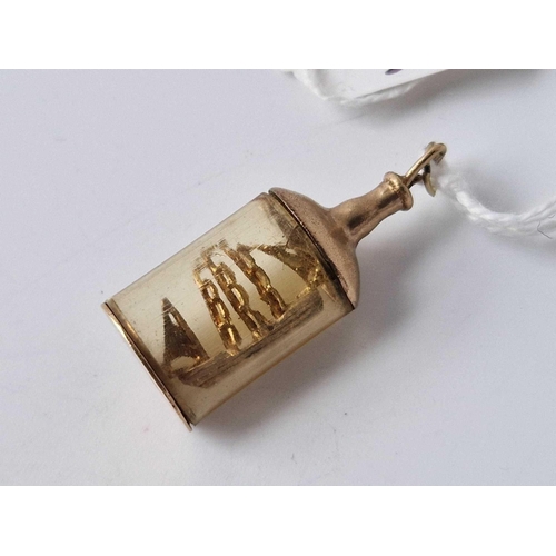 271 - An unusual heavy 9ct �Ship in a bottle� charm 4.9g