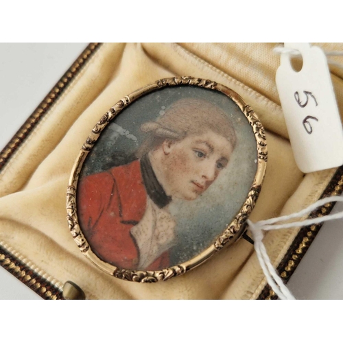 56 - 18thc gold rim hand painted miniature of a young man set in a brooch boxed