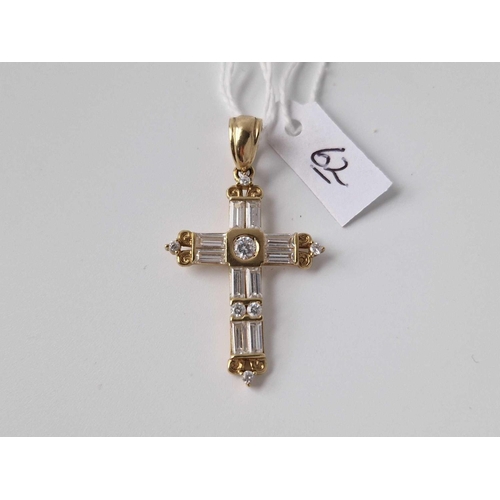 62 - A large white stone set 9ct cross/pendant 5.6g