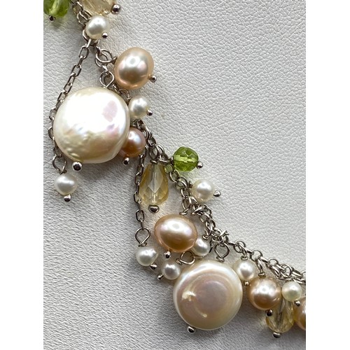 202 - A silver pearl necklace