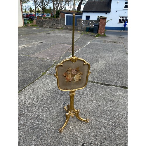 1657 - Victorian gilt pole sceen on tripod base, with needlework panel