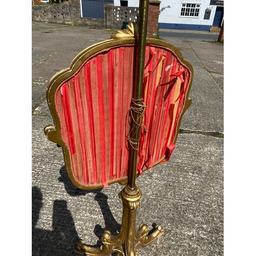 1657 - Victorian gilt pole sceen on tripod base, with needlework panel