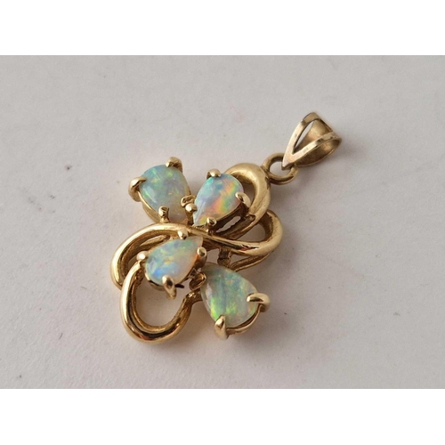 104 - A opal stone pendant with matching earrings 10ct gold