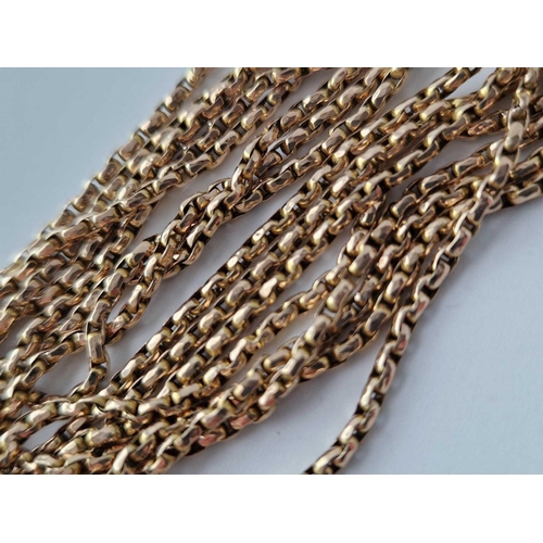 111 - A ANTIQUE GUARD CHAIN 10CT GOLD 59 INCH 22.3 GMS