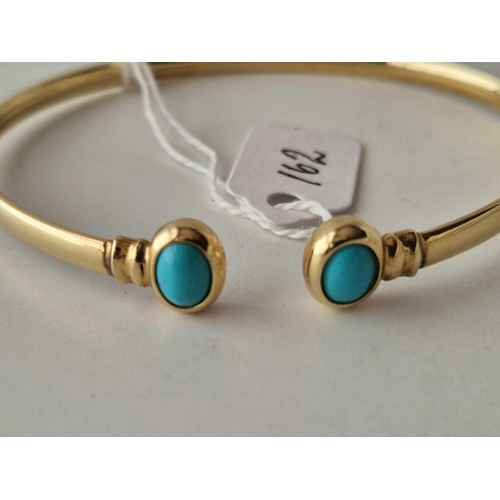 162 - A TURQUOISE BANGLE 14CT GOLD 9.8 GMS