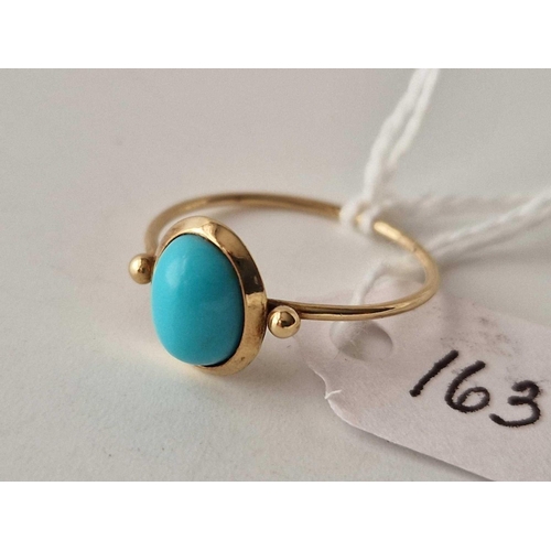 163 - A turquoise ring 14ct gold size N 1.2 gms