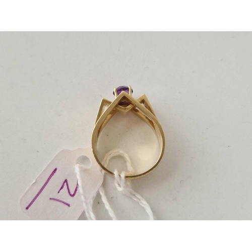 21 - A 1960S ABSTRACT RING SET WITH A AMETHYST AND SIGNED Br.J 14CT GOLD SIZE N 6.7 GMS