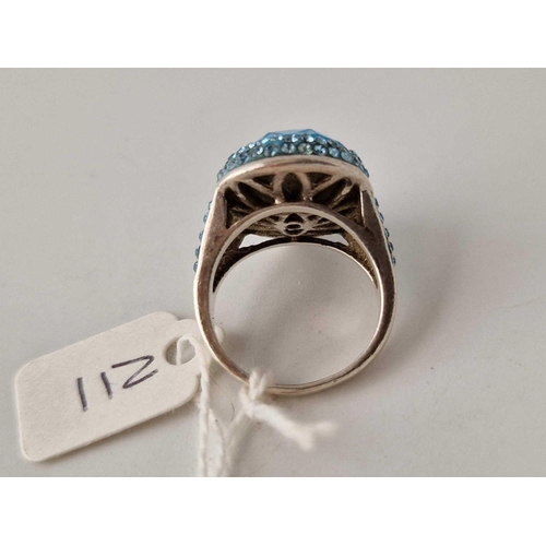 211 - A silver blue stone dress ring