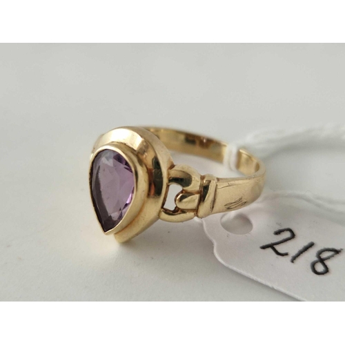 218 - A tear drop amethyst ring 9ct size Q 3.9 gms