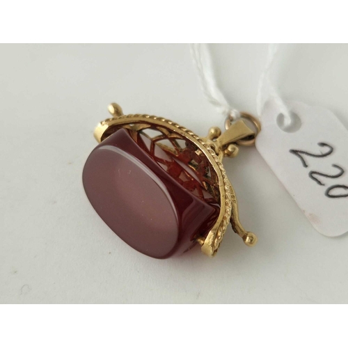 220 - A carnelian swivel fob 9ct