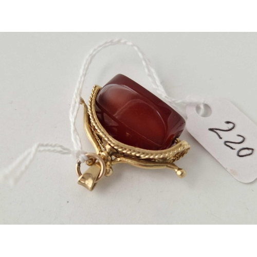 220 - A carnelian swivel fob 9ct