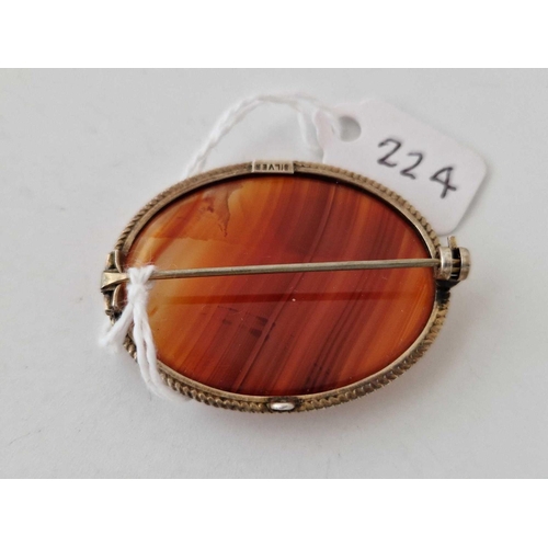 224 - A oval silver mounted agate set brooch