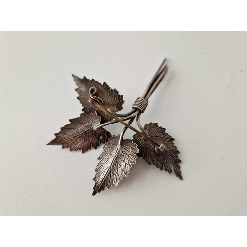 226 - A 1960s silver leaf brooch with ladybird