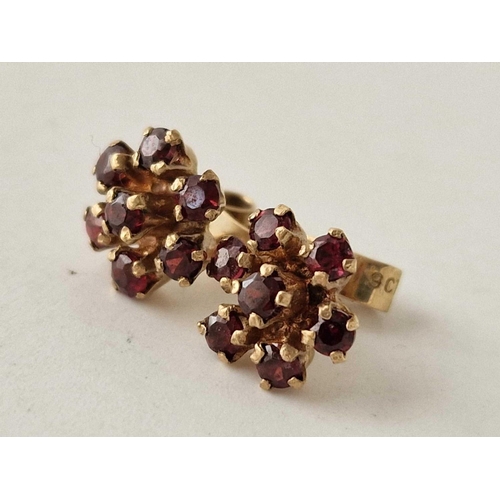 227 - A pair of vintage garnet set cluster flower earrings 9ct