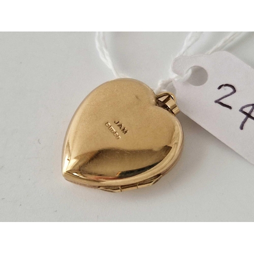 24 - A heart shaped locket 9ct 4 gms