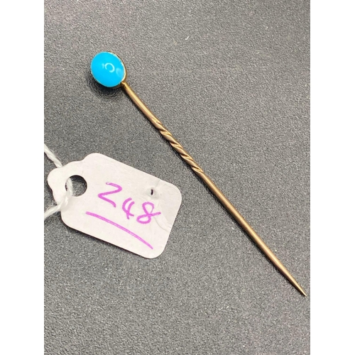 248 - A bright vintage turquoise stick pin High ct. gold