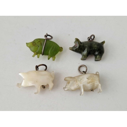 253 - Four Edwardian pig charms inc. MOP nephrite and frosted glass