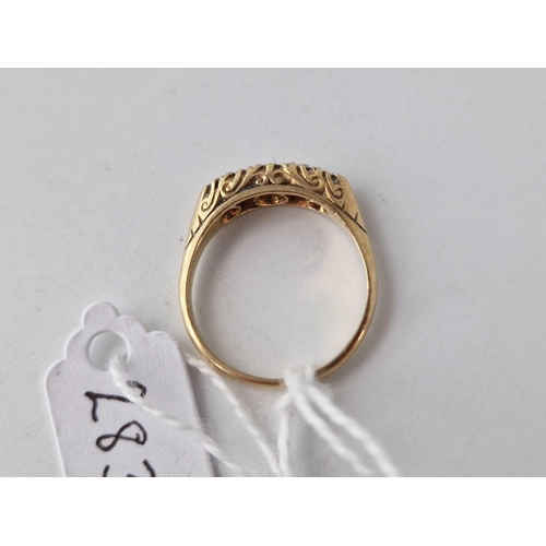 283 - A five stone diamond ring 18ct gold size Q 3.8 gms