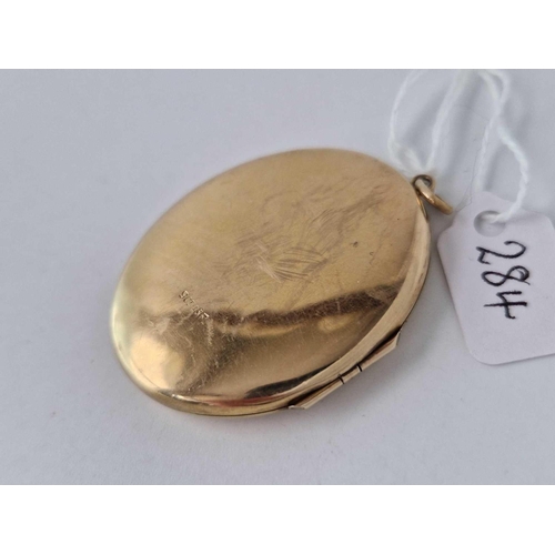 284 - A large back and front locket 9ct 17.2 gms