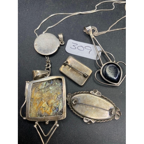 309 - A Abalone silver pendants and brooches and art nouveau silver pendant 40 gms