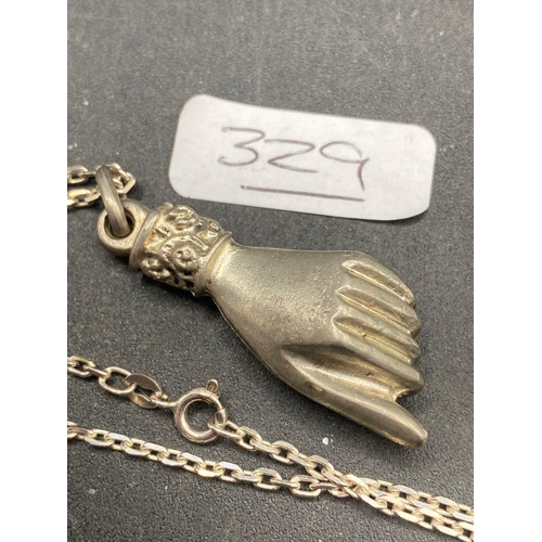 329 - A silver religious hand necklace 15 gms