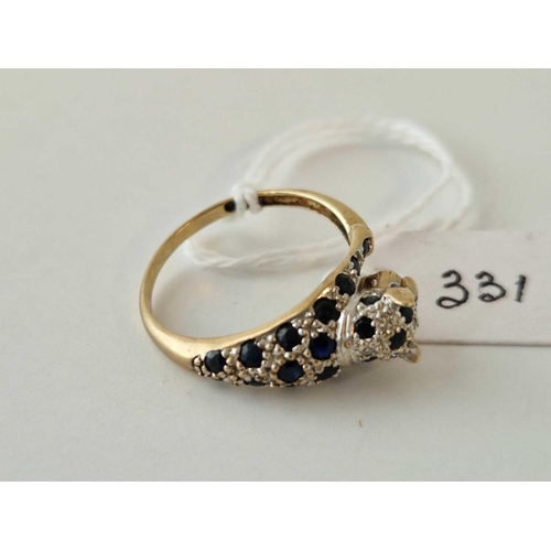 331 - A leopard design sapphire ring 9ct size P 2.7 gms