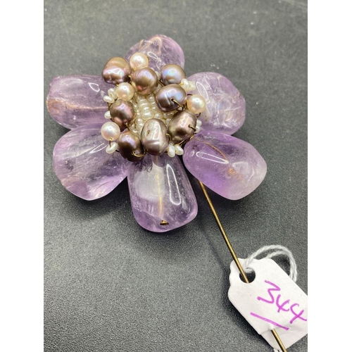 344 - A huge amethyst and multi coloured pearl hand crafted brooch stick pin 200 carats