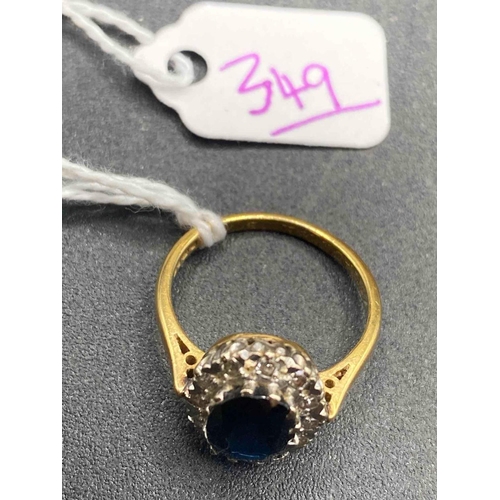 349 - A fine sapphire cluster ring 18ct gold size L