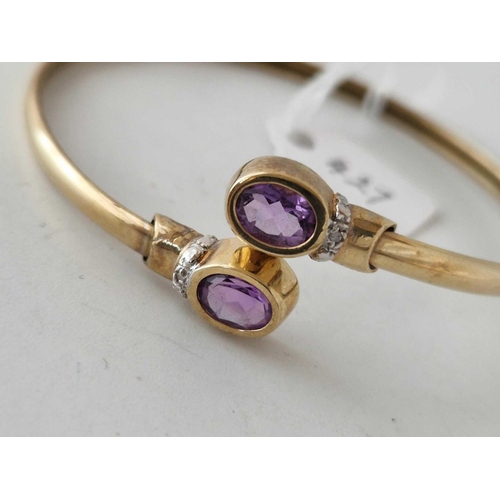 427 - A amethyst and diamond bangle 9ct 6.8 gms