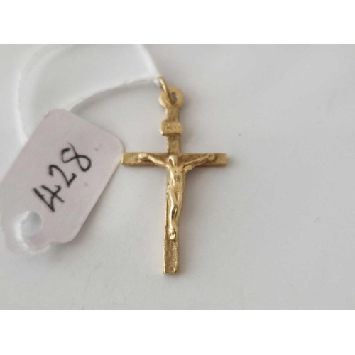 428 - A crucifix pendant 9ct 1.9 gms