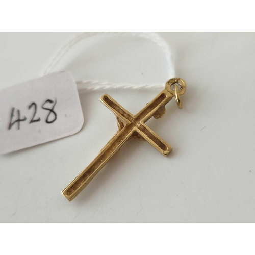 428 - A crucifix pendant 9ct 1.9 gms