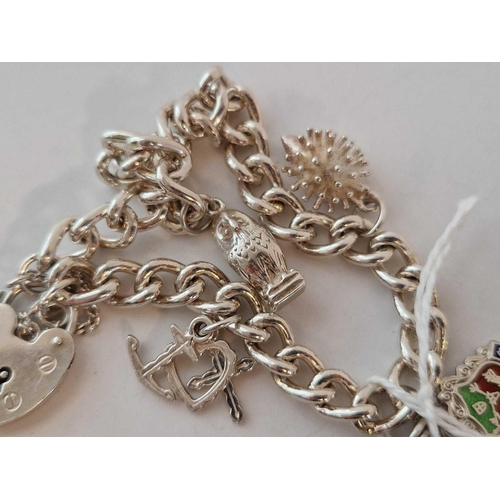 433 - Two silver charm bracelets 71 gms