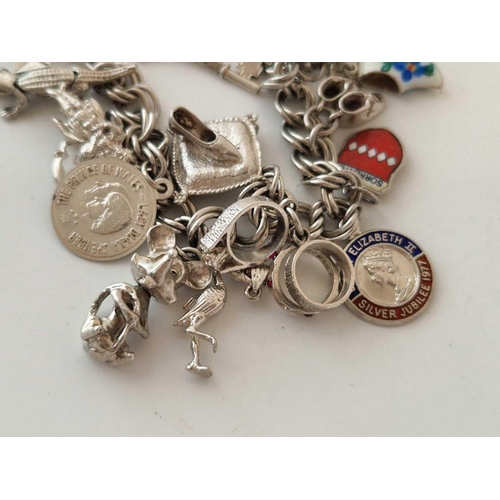 433 - Two silver charm bracelets 71 gms