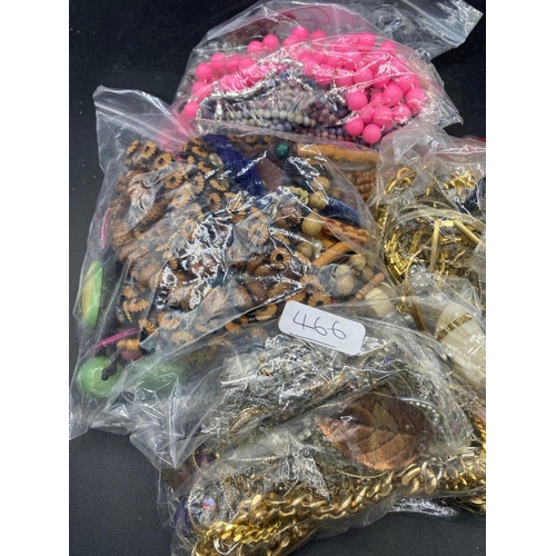 466 - Four large bags of assorted costume jewellery