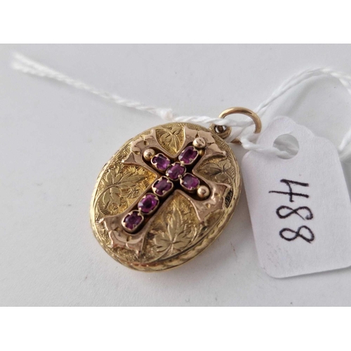 488 - A Victorian gold locket with ruby cross design 6.6 gms