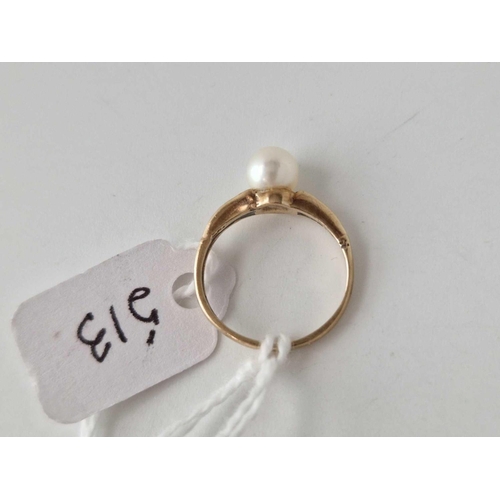 513 - A pearl ring 9ct size F 1.3 gms