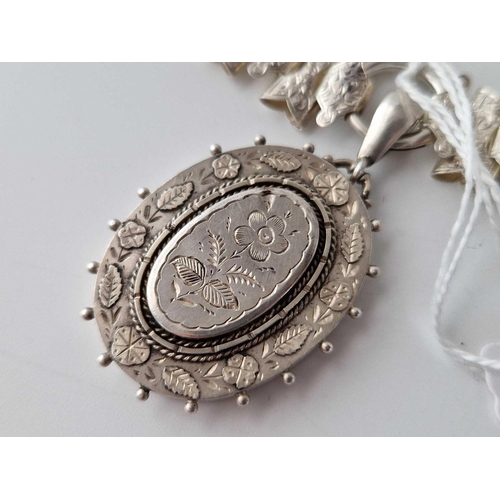 590 - A Victorian silver locket on collar 16 inch