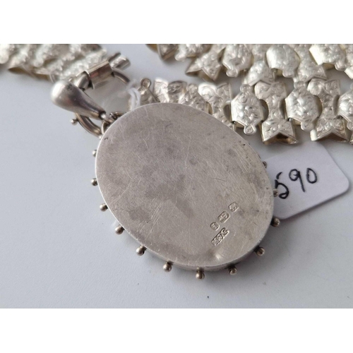 590 - A Victorian silver locket on collar 16 inch